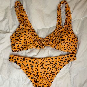 orange and black print bikini